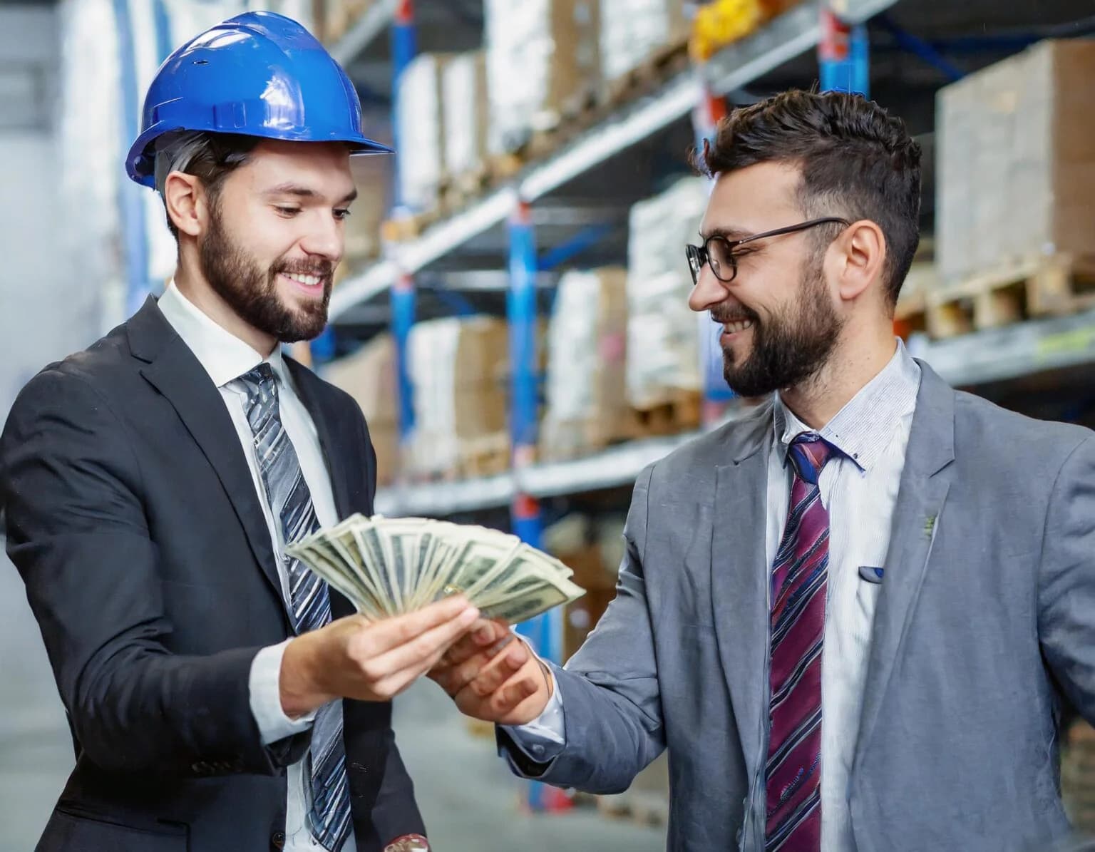 Warehouse manager receives cash from WDRacks buyer.